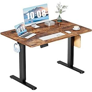 Dumos 48-inch electric standing desk with adjustable height mechanism, available in natural oak or rustic finish.