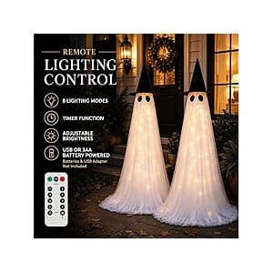 Two white 5-foot tall light-up ghost decorations with glowing features for outdoor Halloween display.