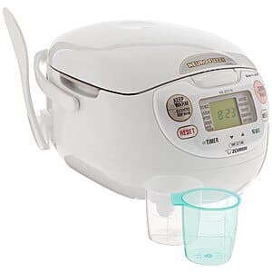 White Zojirushi Neuro Fuzzy 5.5-cup rice cooker with stainless steel body and control panel.