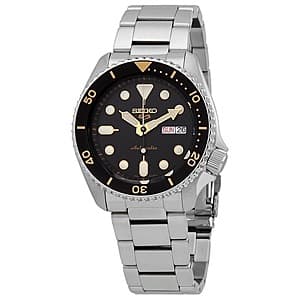 Seiko 5 Sports SRPD57K1 automatic men's watch with black dial, stainless steel case, rotating bezel, and matching bracelet.