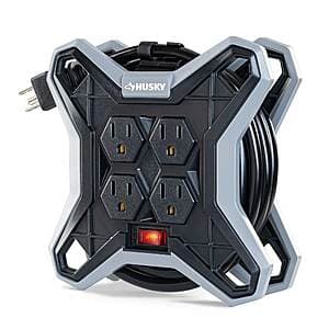 Husky 15 ft. extension cord reel with integrated 4-outlet power strip and cord storage.
