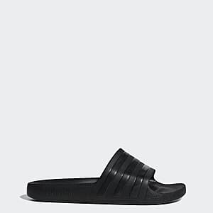 adidas Men's Adilette Aqua Slides in Core Black, a minimalist pool slide with the classic three-stripe branding on the strap.