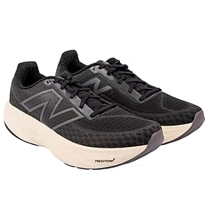 Pair of black New Balance athletic running shoes with white cushioned sole and grey accents, displayed at an angle.