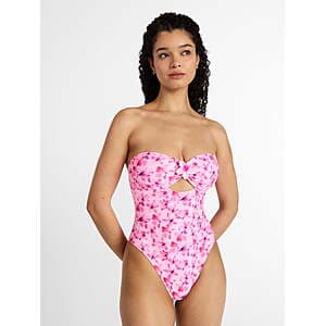 No Boundaries floral cut out bandeau one-piece swimsuit in women's sizing with colorful floral print design.