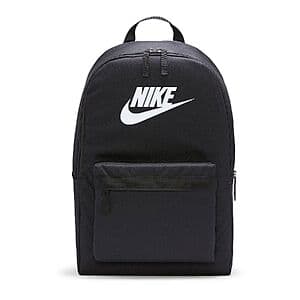 Black Nike Heritage backpack with zippered compartments and 15-inch laptop sleeve, polyester construction.