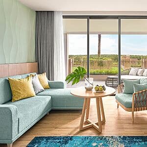 IHG One Rewards logo and promotional banner highlighting bonus elite night credits offer.