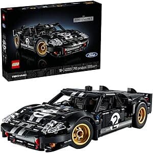 793-piece LEGO Technic set featuring the iconic white and blue 1966 Ford GT40 MKII race car model with detailed racing design and working mechanical components.