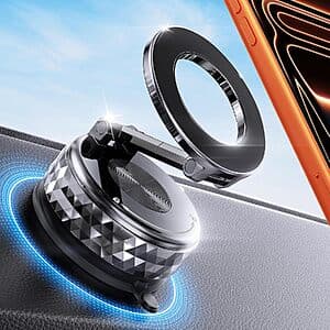 Compact foldable phone mount with zinc-alloy arm, 360° rotatable base, and ball joint in folded position behind a vehicle dashboard.