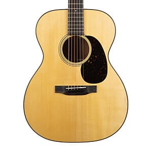 Collection of acoustic guitars featuring models from Taylor, Martin, Gibson and other major brands displayed for summer clearance sale.