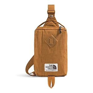 The North Face Berkeley Field Bag in Timber Tan and Black, a crossbody sling style bag.