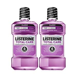 Two 33.8 oz bottles of Listerine Total Care Anticavity Fluoride Mouthwash with blue labeling.