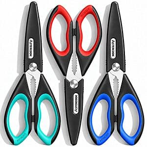 Three color-coded kitchen shears with stainless steel blades in red, blue, and turquoise with included blade covers.