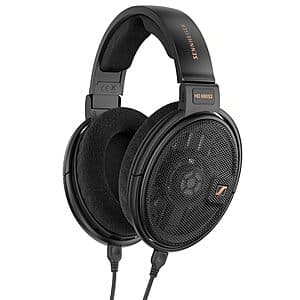 Sennheiser HD 660S2 open-back over-ear headphones with black ear cups and silver metal headband against neutral background.