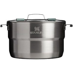 Stainless steel camping pot with folding handles and lid, featuring the Stanley logo on the front.