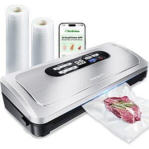 Stainless steel 10-in-1 vacuum sealer machine with digital display, built-in cutter, and roll storage compartment.