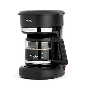 Black Mr. Coffee 5-cup drip coffee maker with switch controls and glass carafe.