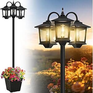 Black 74-inch solar lamp post with three adjustable heads, integrated planter box at the base, and Edison-style bulbs.