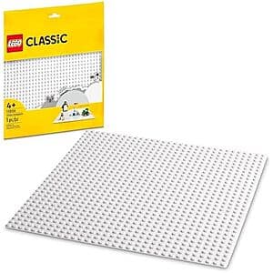 White square LEGO baseplate with dot grid studs, designed for building and displaying LEGO creations.