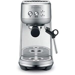 Breville Bambino espresso machine with brushed stainless steel body and compact design.