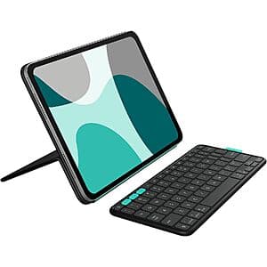 Logitech Flip Folio keyboard case in Off-White for iPad Pro 11 inch with integrated keyboard and protective folio design.