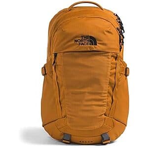 The North Face Recon 30L backpack in tan with front pockets and laptop compartment.