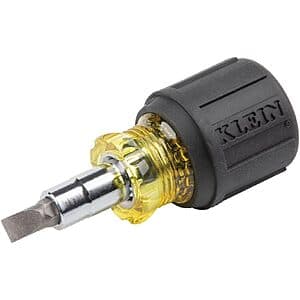 Klein Tools 6-in-1 multi-bit screwdriver with stubby design and nut driver head, compact yellow and black tool.