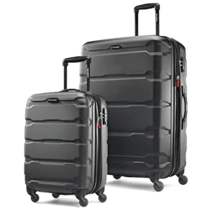Polycarbonate carry-on spinner luggage with micro-diamond texture finish, featuring lightweight spinner wheels and side-mounted TSA lock.