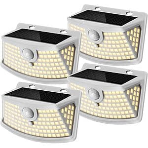 Four white warm-light solar motion sensor lights with 120 LEDs each, featuring integrated solar panels and motion detection sensors for outdoor use.