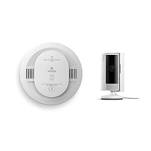 Ring Alarm Pro Smoke & CO Detector with white cylindrical alarm unit and Indoor Cam (2nd Gen) displayed together.