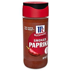 1.75 oz container of McCormick Smoked Paprika spice blend with red label and black text.
