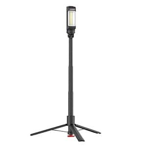 Husky work light with multiple brightness settings, featuring a black telescopic tripod base and integrated battery indicator display.