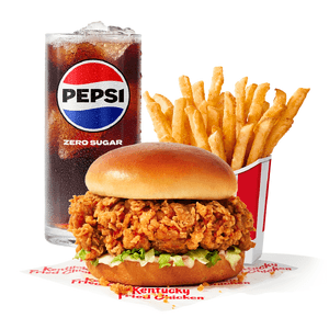 KFC Spicy Chicken Zinger Sandwich Combo featuring a crispy fried chicken sandwich with toppings, served with a side and beverage.