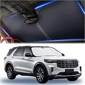 Aokdom 300T automotive windshield sunshade in dark material with storage bag, rectangular shape sized 57.08" x 31.5".