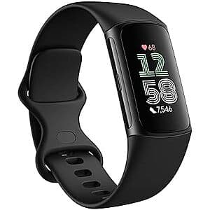 Fitbit Charge 6 fitness tracker with black case and black band displayed against a neutral background.