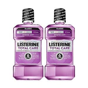 Two 33.8-ounce bottles of Listerine Total Care Anticavity Fluoride Mouthwash with blue labeling and packaging.