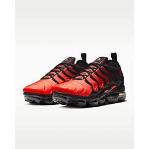 Nike Air VaporMax Plus shoes in Black/Anthracite/White/Bright Crimson colorway with visible VaporMax Air cushioning sole.
