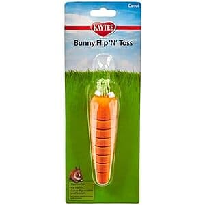 Orange carrot-shaped chew toy with ridged texture designed for rabbits and guinea pigs.