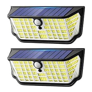 TuyLuxe 2-pack of black solar motion sensor flood lights with 300° wide-angle coverage, shown with cool white LED output.