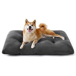 Large dark gray washable dog crate bed measuring 35"x23"x3" with cushioned padding.