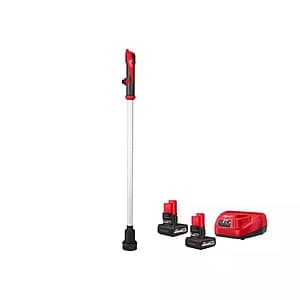 Milwaukee M12 12V cordless submersible water transfer pump with 3/4 inch brass outlet, shown with two 5.0Ah batteries and black charger unit.