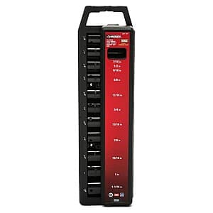 Husky hand tool set with various tools including wrenches, sockets, and other basic tools in a storage case or organizer.
