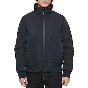 Tommy Hilfiger men's navy zip-front bomber jacket with flex performance fabric, displayed flat or on model in multiple colorways.