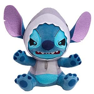 Stitch plush toy dressed in shark costume with toothy grin, 7 inches tall, made from soft polyester with embroidered details.
