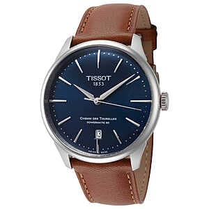 Tissot Chemin des Tourelles 39mm men's automatic watch with blue dial and classic round face design.