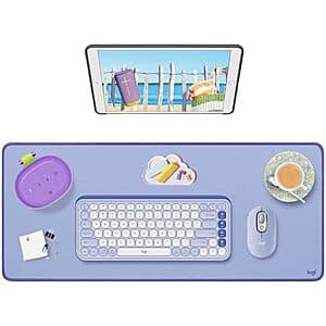 Logitech Desk Mat in lilac purple color, a rectangular mouse and keyboard pad for desk workspace.