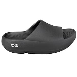 Black OOFOS OOAHH+ unisex recovery sandals with cushioned sole and contoured footbed.