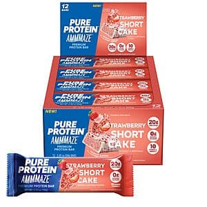 Box of Pure Protein AMMMAZE Strawberry Shortcake Protein Bars containing 12 individually wrapped bars with strawberry-themed packaging.