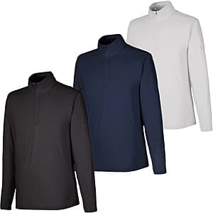Three Puma men's quarter-zip pullovers in gray, navy, and black colorways with UPF 30+ sun protection labeling.