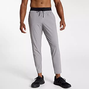 VRST Men's Elevate Pant in silver shadow color with tapered fit, displayed flat or on model showing slim hip and thigh with narrowed leg from knee to hem.