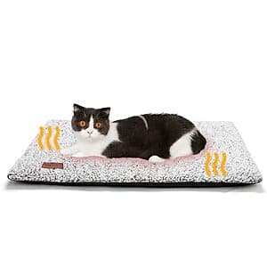 24"x18" light grey and dark grey self-heating pet pad with removable carbon-infused cover, laid flat for pet use.